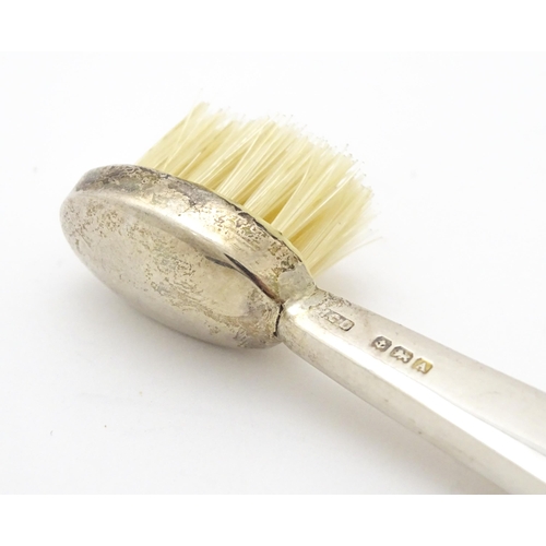 320 - Two silver moustache brushes, one hallmarked Birmingham 1925, maker Henry Clifford Davis, the other ... 