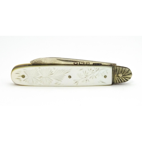 324 - A silver folding fruit knife with engraved mother of pearl handle, hallmarked Sheffield 1905, maker ... 