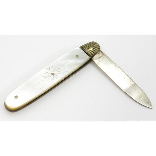 324 - A silver folding fruit knife with engraved mother of pearl handle, hallmarked Sheffield 1905, maker ... 