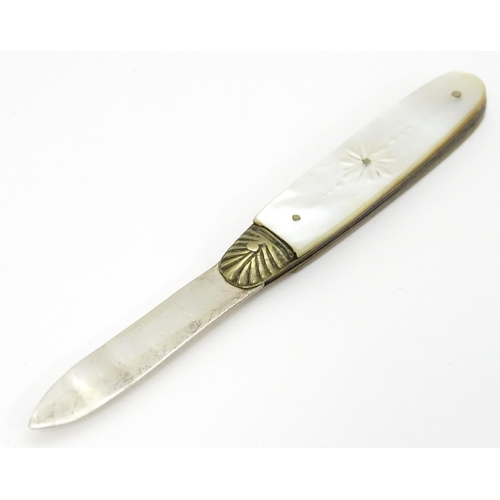 324 - A silver folding fruit knife with engraved mother of pearl handle, hallmarked Sheffield 1905, maker ... 