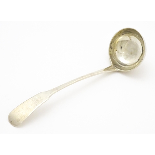 327 - A Scottish silver cream ladle hallmarked Edinburgh 1815, maker Andrew Wilkie. Approx. 6