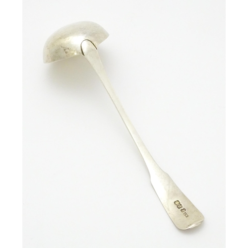 327 - A Scottish silver cream ladle hallmarked Edinburgh 1815, maker Andrew Wilkie. Approx. 6