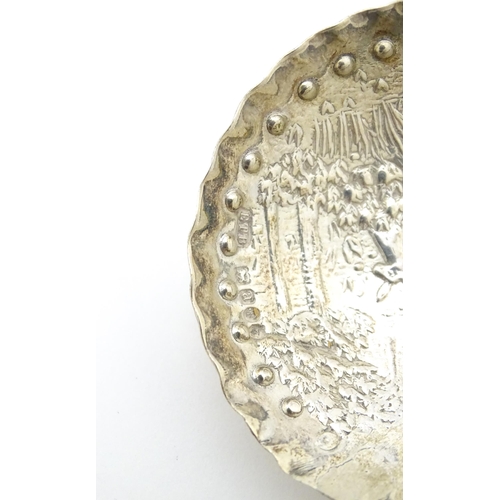 331 - A Dutch silver caddy spoon, bearing import marks for London 1896, importer Edwin Thompson Bryant. Ap... 