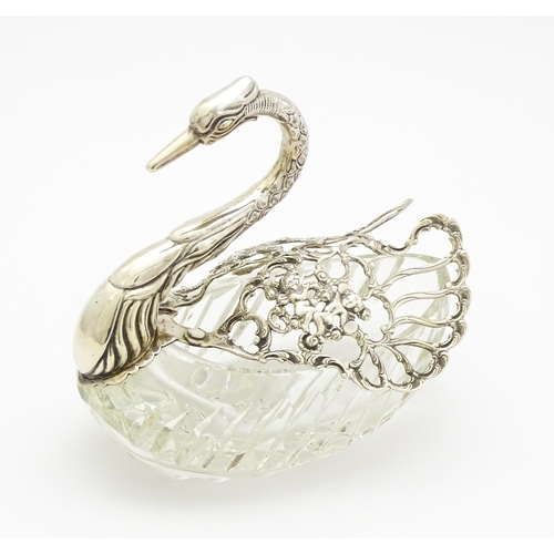 340 - A cut glass and silver table salt modelled as a swan., bearing import marks for London c. 1966, impo... 