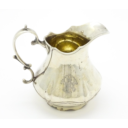 351 - A silver cream jug hallmarked Sheffield 1904, maker Levesley Brothers, stamped under Carmen with reg... 