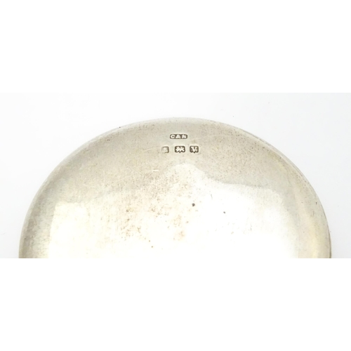 358 - A small silver hand mirror with compact section to back hallmarked Birmingham 1912, maker Crisford &... 