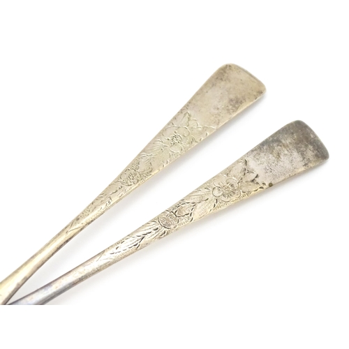 359 - A pair of William IV Irish silver berry spoons, the gilded bowls with embossed flower and bird detai... 