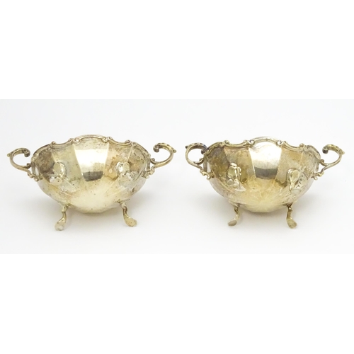 368 - A pair of Victorian silver salts with twin handles hallmarked Birmingham 1897, maker Henry Matthews.... 