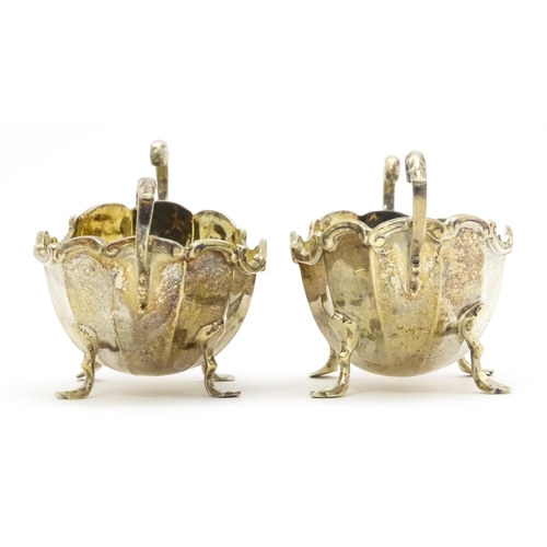 368 - A pair of Victorian silver salts with twin handles hallmarked Birmingham 1897, maker Henry Matthews.... 