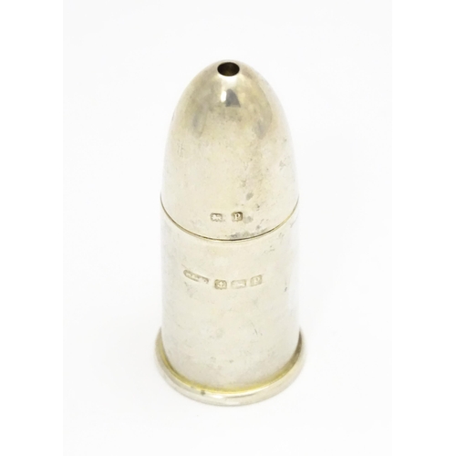 369 - A silver salt of bullet form with gilded interior, hallmarked Birmingham 1914. Approx. 2 1/4