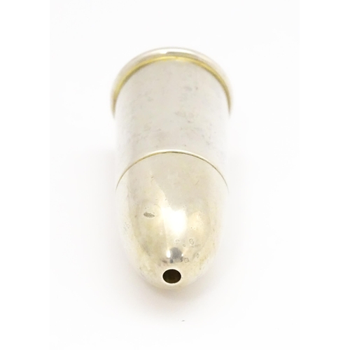 369 - A silver salt of bullet form with gilded interior, hallmarked Birmingham 1914. Approx. 2 1/4