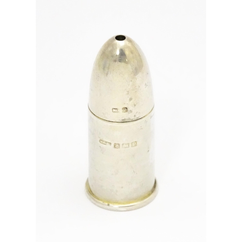 369 - A silver salt of bullet form with gilded interior, hallmarked Birmingham 1914. Approx. 2 1/4