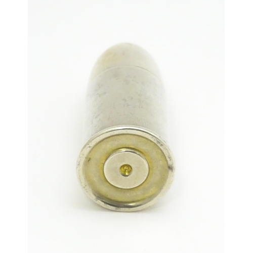 369 - A silver salt of bullet form with gilded interior, hallmarked Birmingham 1914. Approx. 2 1/4