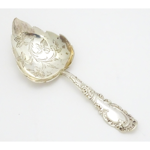 375 - A Victorian silver caddy spoon with leaf formed bowl, hallmarked Birmingham 1898, maker Joseph Glost... 