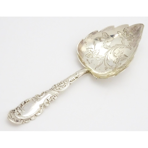 375 - A Victorian silver caddy spoon with leaf formed bowl, hallmarked Birmingham 1898, maker Joseph Glost... 