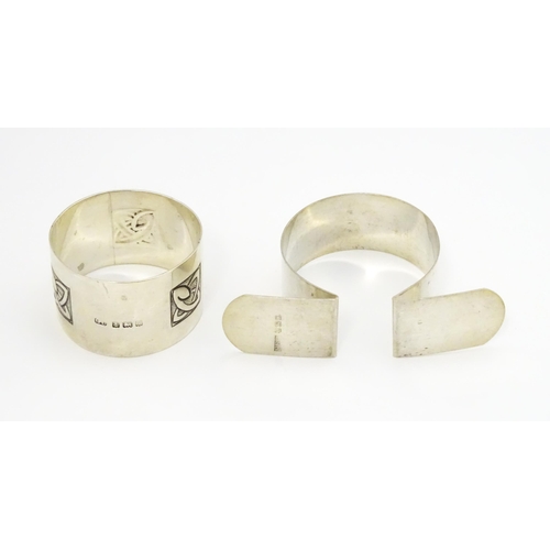 377 - Two silver napkin rings, one with Celtic details hallmarked Birmingham 1908, maker George Unite, the... 