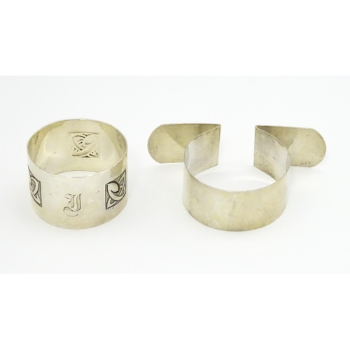 377 - Two silver napkin rings, one with Celtic details hallmarked Birmingham 1908, maker George Unite, the... 