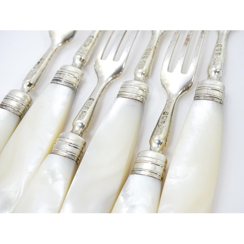 380A - A set of six Victorian silver forks with mother of pearl handles, hallmarked Sheffield 1898, maker M... 