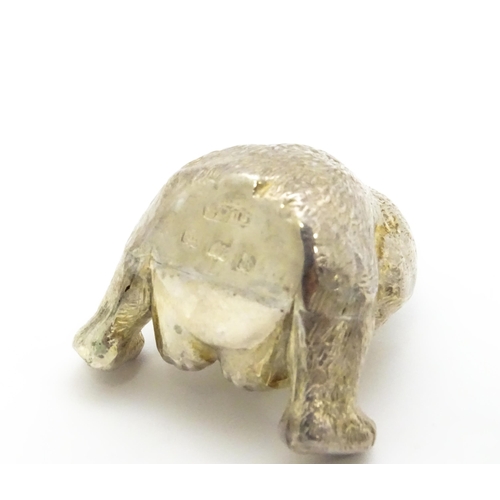 382 - A novelty silver pepperette formed as a teddy bear, hallmarked Birmingham 1909, maker Spurrier & Co.... 