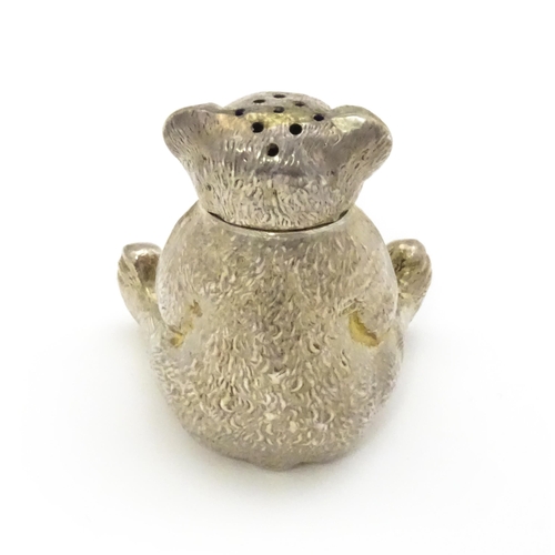 382 - A novelty silver pepperette formed as a teddy bear, hallmarked Birmingham 1909, maker Spurrier & Co.... 