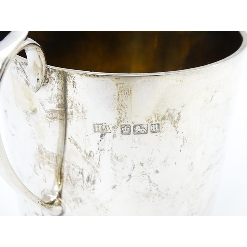 388 - A silver twin handled loving cup with gilded interior, hallmarked Sheffield 1912, maker Atkin Brothe... 