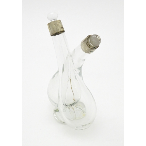 389 - A glass oil and vinegar bottle with silver mounts hallmarked London 1902, maker John Hazlewood Worra... 