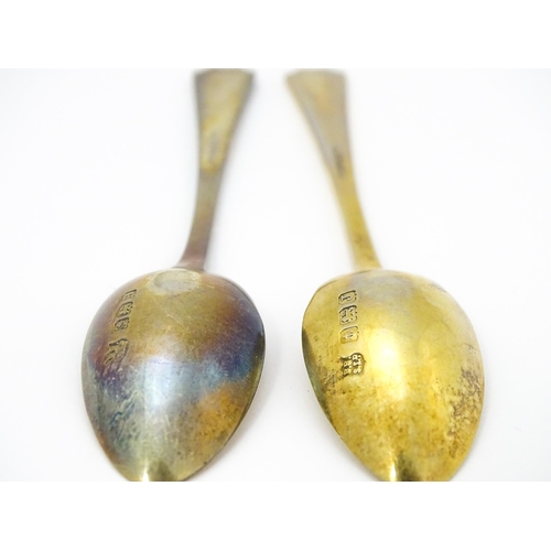 393 - A pair of Art Deco silver gilt teaspoons with enamel decoration to handles, hallmarked Birmingham 19... 