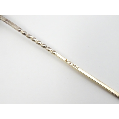 396 - A silver cocktail stick with twist detail and flower finial set with pink cabochon, hallmarked Chest... 