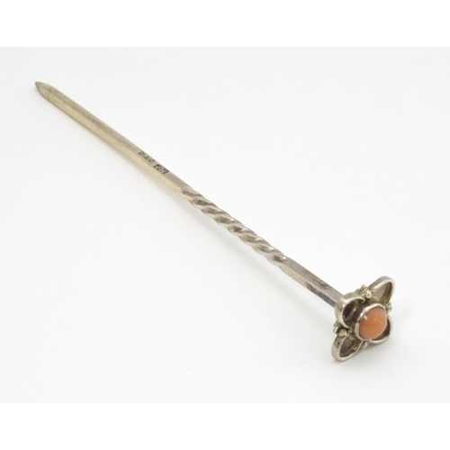 396 - A silver cocktail stick with twist detail and flower finial set with pink cabochon, hallmarked Chest... 