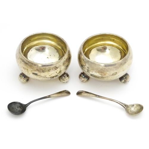 399 - A pair of Victorian silver salts raised on three ball feet, hallmarked Birmingham 1900, maker Hillia... 