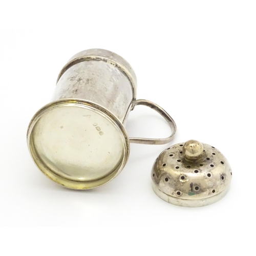 401 - A silver pepperette formed as a small flour shaker, hallmarked London 1814. Approx. 2 3/4