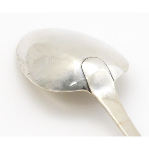 407 - A Geo III silver table spoon hallmarked London 1810, maker Alexander Hewat. Approx. 9