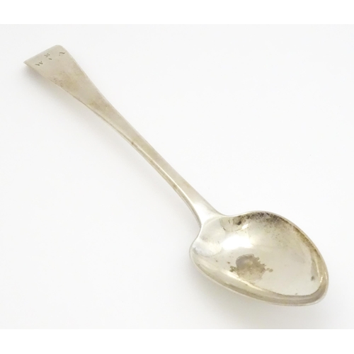 407 - A Geo III silver table spoon hallmarked London 1810, maker Alexander Hewat. Approx. 9