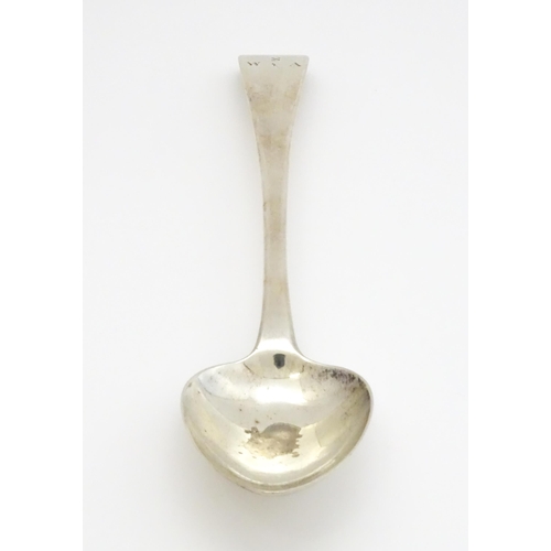 407 - A Geo III silver table spoon hallmarked London 1810, maker Alexander Hewat. Approx. 9