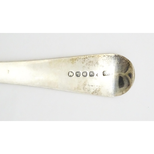 407 - A Geo III silver table spoon hallmarked London 1810, maker Alexander Hewat. Approx. 9