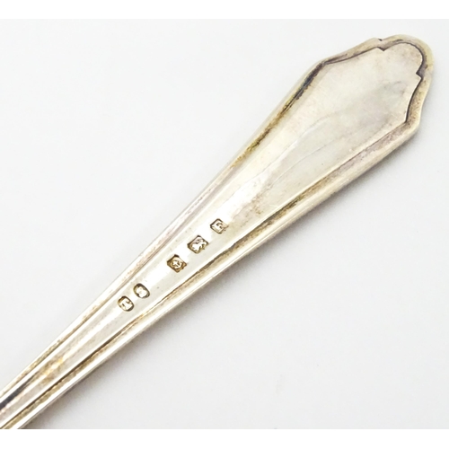 419 - Three assorted silver items to include a bread fork hallmarked Birmingham 1930, and two preserve spo... 