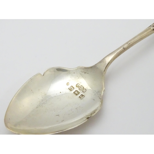 419 - Three assorted silver items to include a bread fork hallmarked Birmingham 1930, and two preserve spo... 