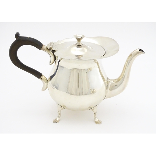 438 - A silver three piece tea set comprising teapot, sugar bowl and milk jug hallmarked London 1905, make... 