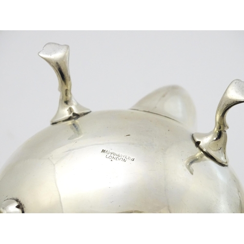 438 - A silver three piece tea set comprising teapot, sugar bowl and milk jug hallmarked London 1905, make... 