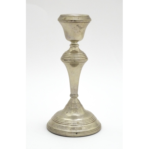 449 - A silver candlestick hallmarked Birmingham 1973, maker W. I. Broadway. Approx. 7 1/4