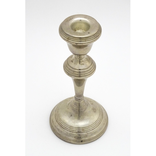 449 - A silver candlestick hallmarked Birmingham 1973, maker W. I. Broadway. Approx. 7 1/4