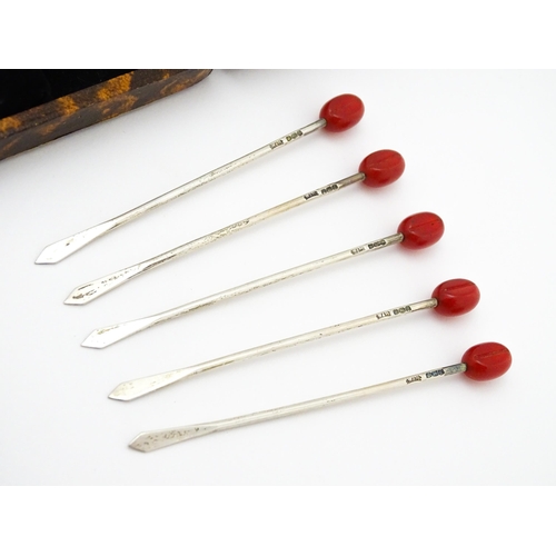 578 - A set of six silver cocktail sticks with red cherry formed finials, hallmarked Sheffield 1945, maker... 