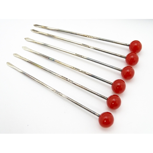 578 - A set of six silver cocktail sticks with red cherry formed finials, hallmarked Sheffield 1945, maker... 