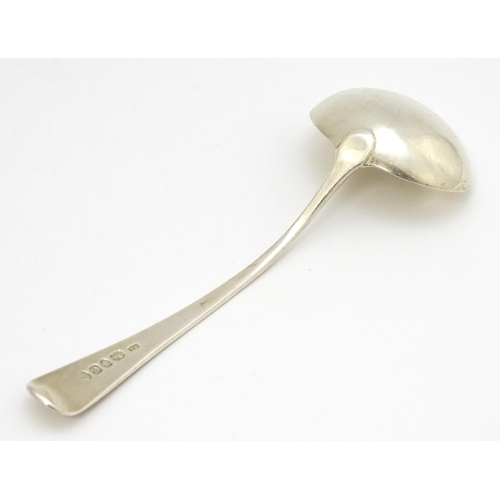 599 - A Geo III silver sauce ladle hallmarked London 1802, maker Stephen Adams II. Approx. 6 3/4