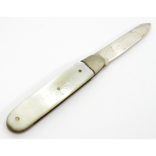 600 - A silver folding fruit knife with engraved mother of pearl handle, hallmarked Sheffield 1913, maker ... 