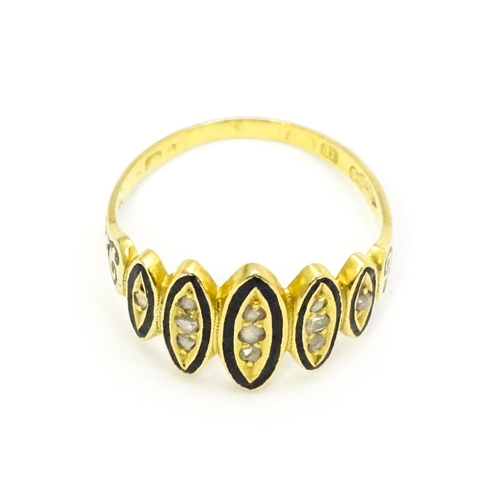 694 - Mourning / Memorial Jewellery: A Victorian gold ring set with diamonds and black enamel detail. Ring... 