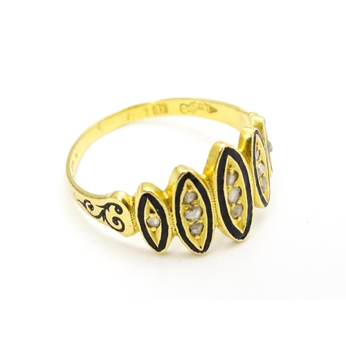 694 - Mourning / Memorial Jewellery: A Victorian gold ring set with diamonds and black enamel detail. Ring... 