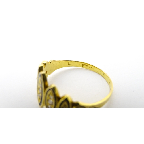 694 - Mourning / Memorial Jewellery: A Victorian gold ring set with diamonds and black enamel detail. Ring... 