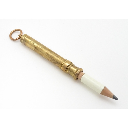 951 - A 9ct gold pencil holder hallmarked Birmingham 1917, maker E. Baker. Approx. 2 1/4