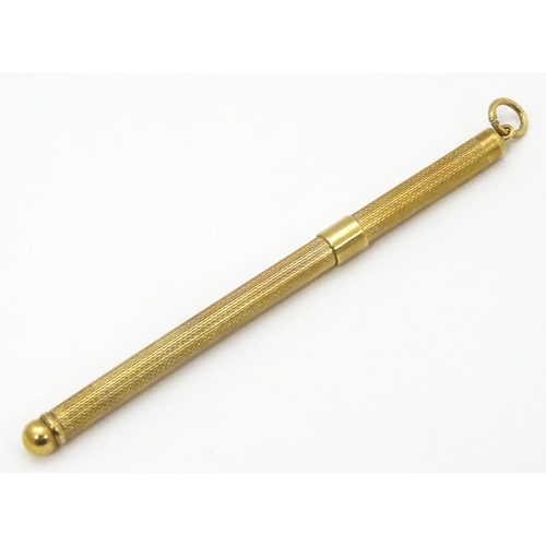 952 - A 9ct gold swizzle stick / cocktail stirrer hallmarked Birmingham 1982, maker William Manton. Approx... 